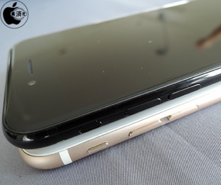 音量を上げる/下げるボタン